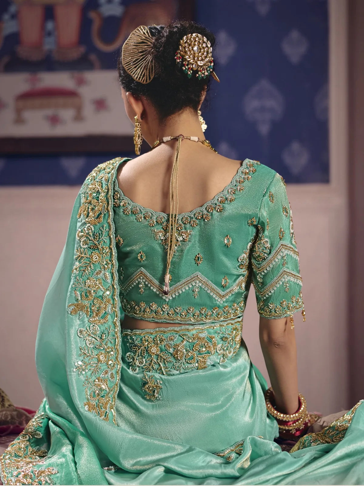 Tarani Adhira teal saree back blouse design with embroidery and bead work