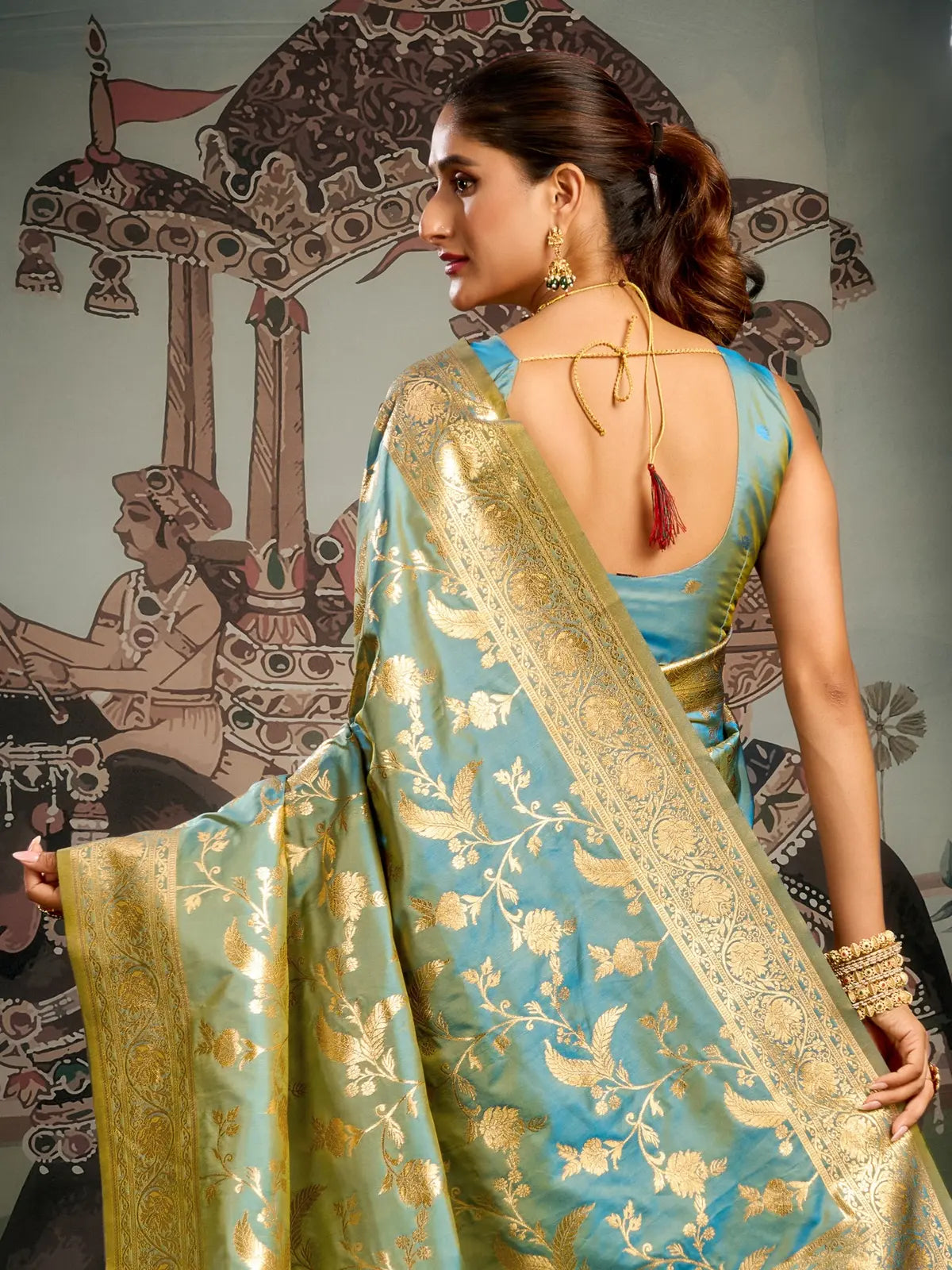 Tarani teal silk saree back view showing blouse design