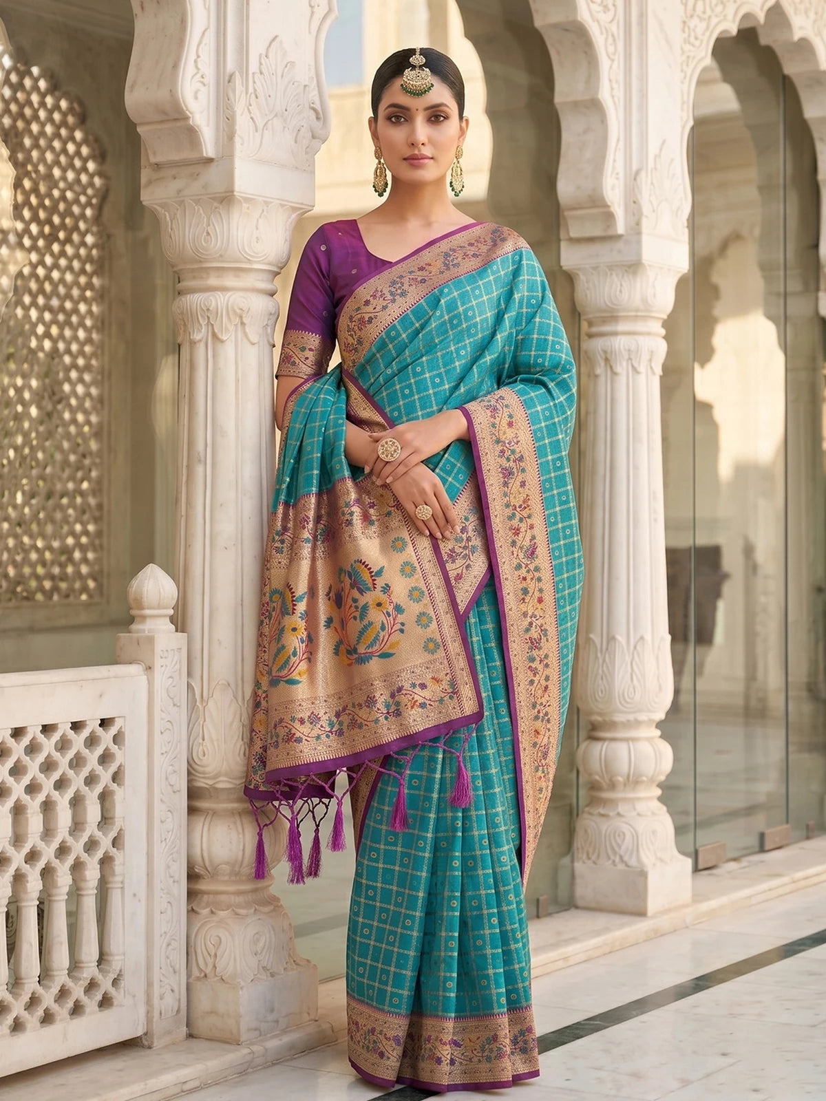 Tarani premium Banarasi silk teal saree with zari checks floral border front view