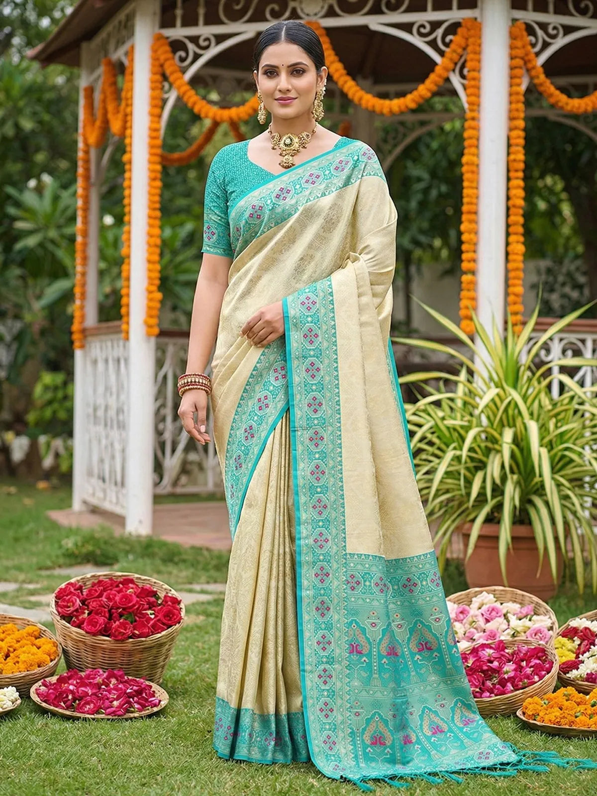 Tarani Avantika premium soft silk teal saree with woven border front full drape for festive and wedding wear