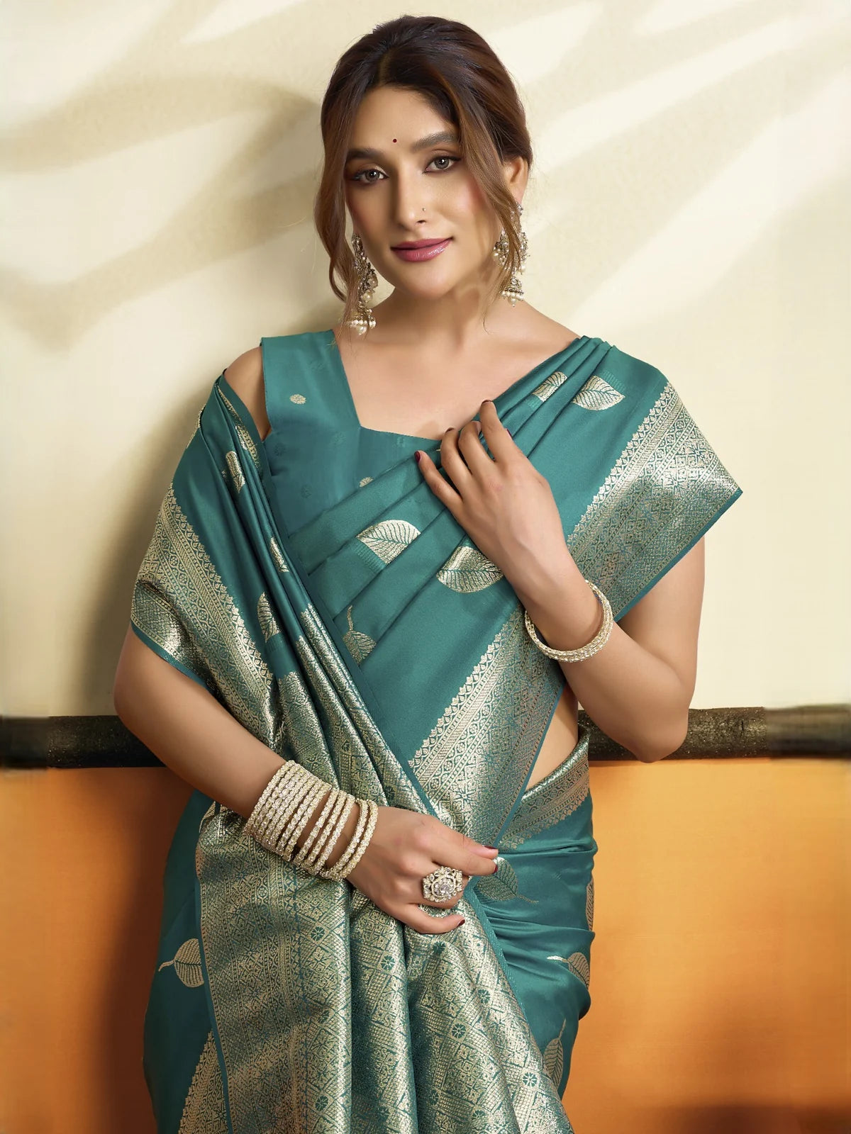 Tarani Reshika teal soft silk saree upper body view with zari leaf motifs and matching blouse