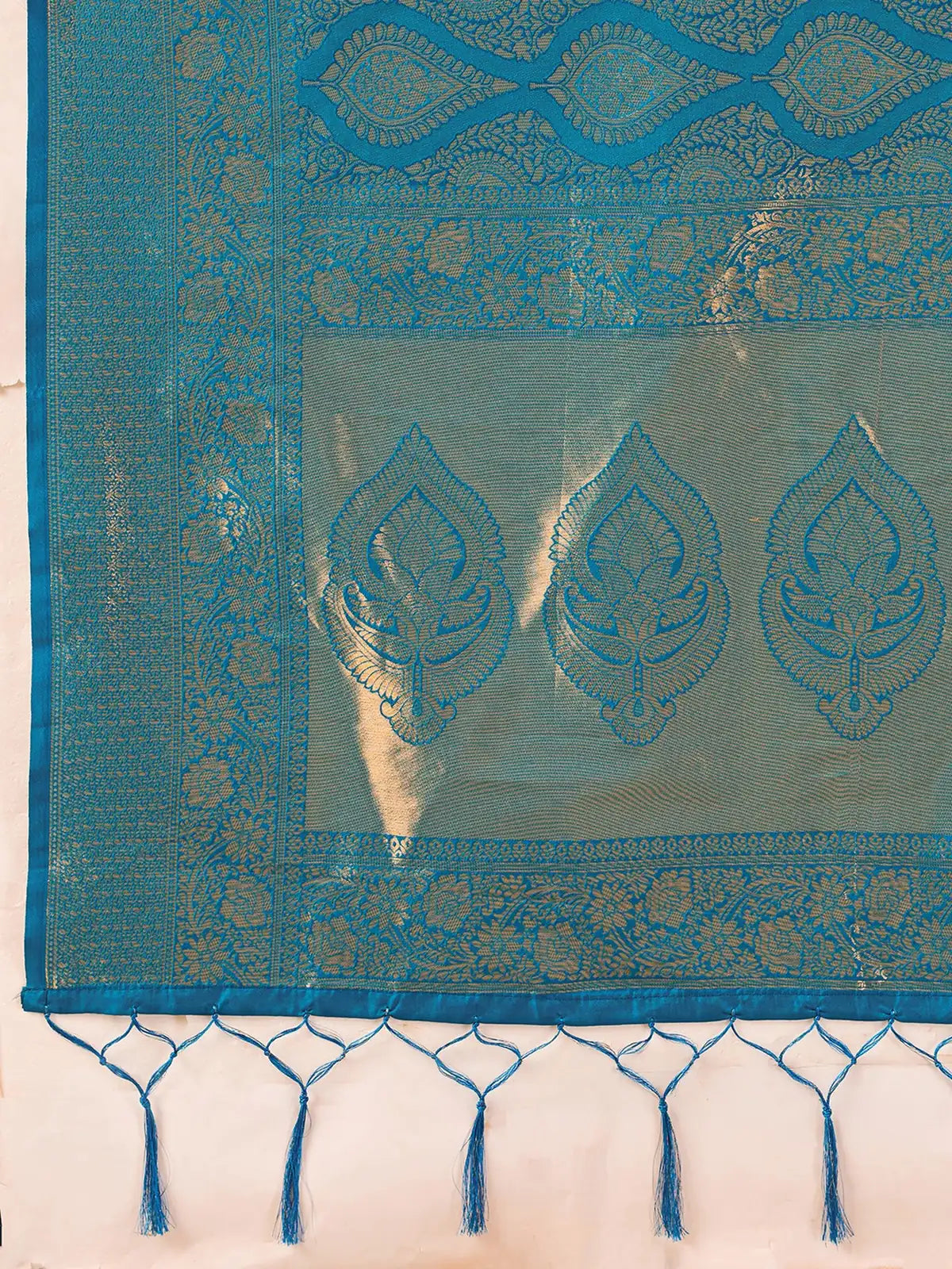 Tarani turquoise blue Kanjivaram silk blend saree closeup of pallu border and zari motifs