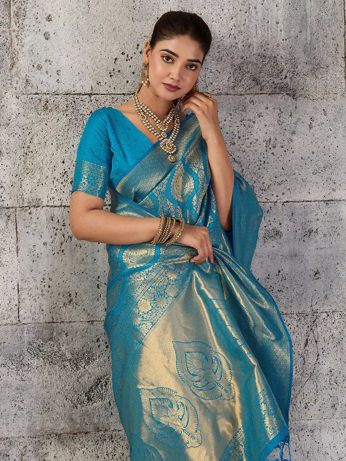 Tarani turquoise blue Kanjivaram silk blend saree elegant front drape with gold zari motifs