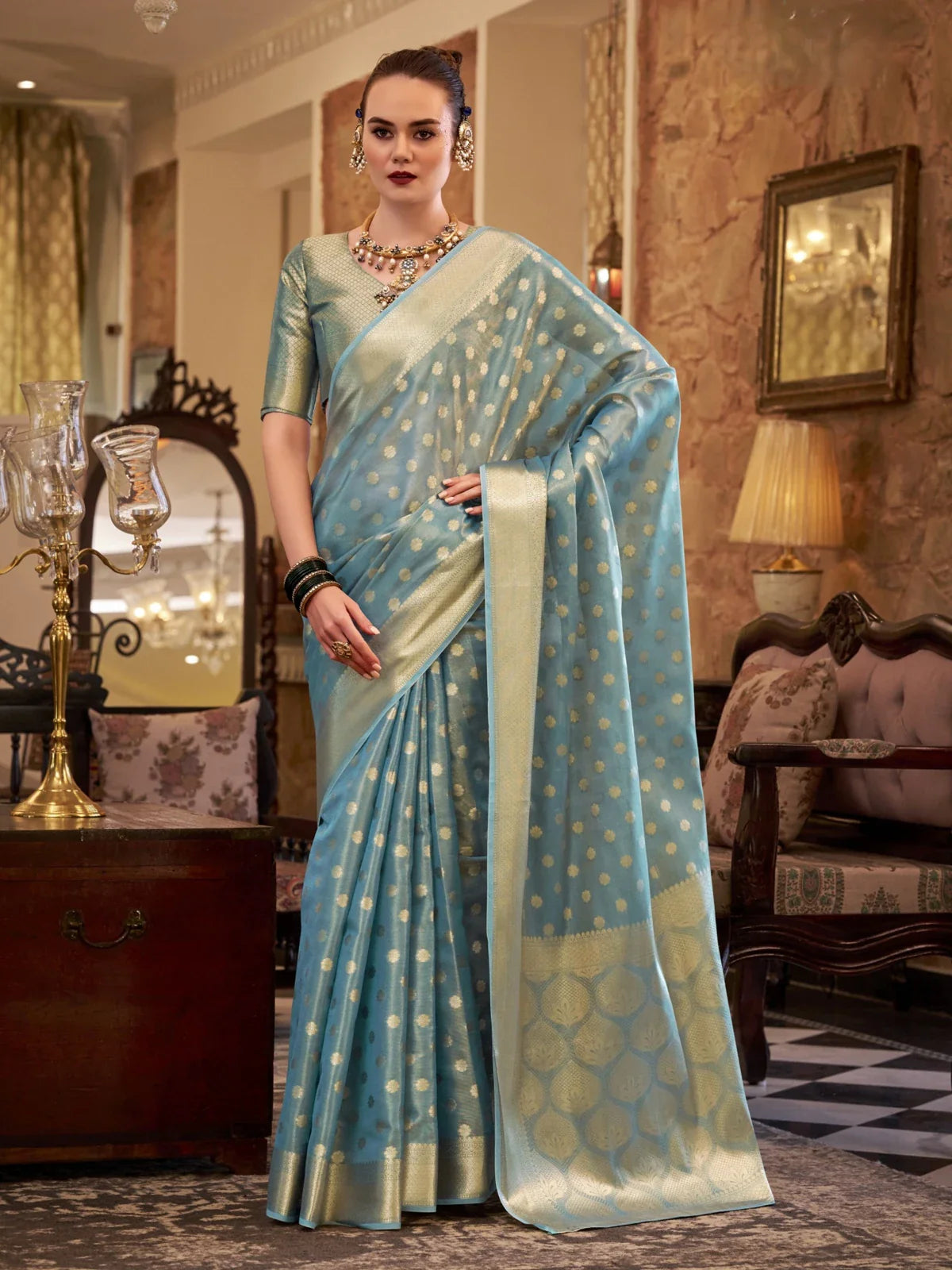 Tarani turquoise tissue silk saree with zari polka motifs and rich border full view