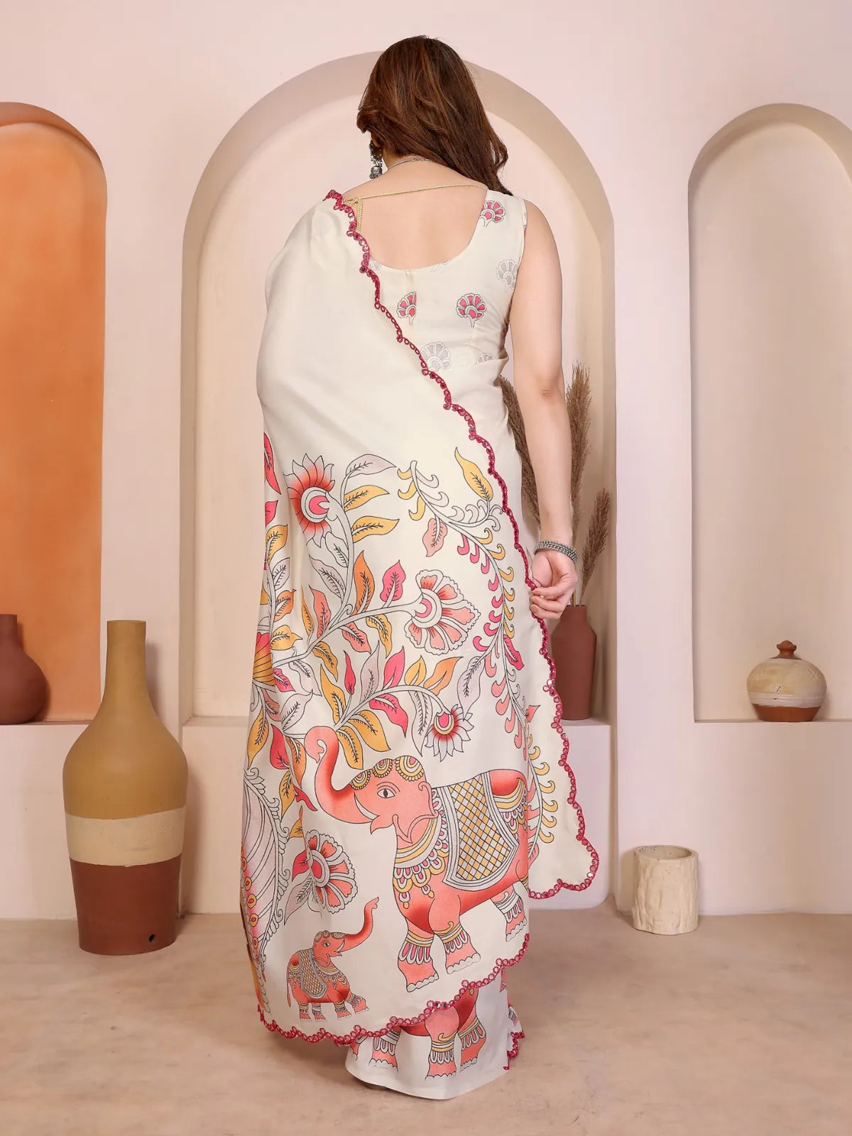 Tarani Manipuri silk saree back view showing full kalamkari print with elephants