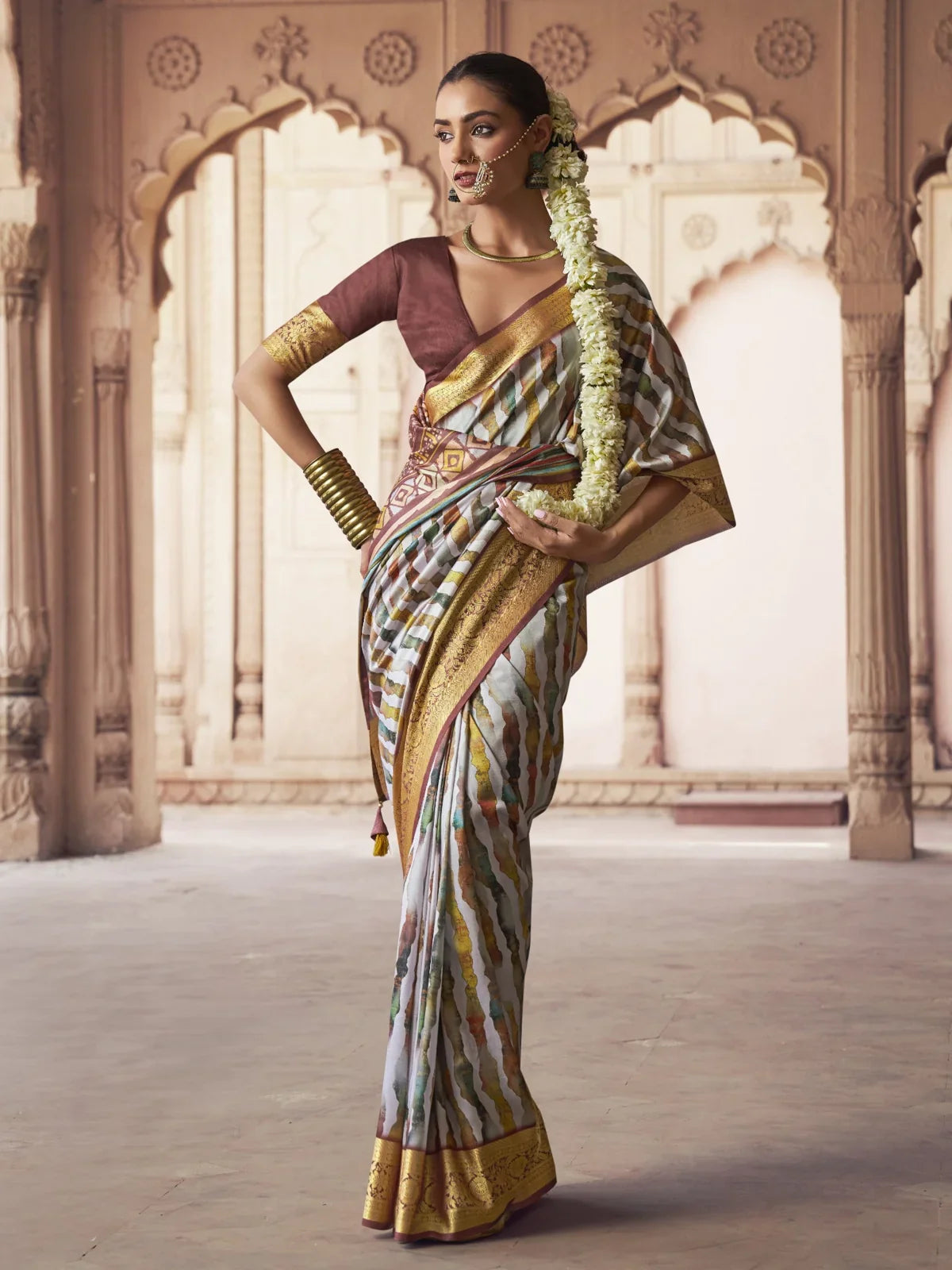 Tarani premium white silk saree with golden zari border and multicolor digital print full view