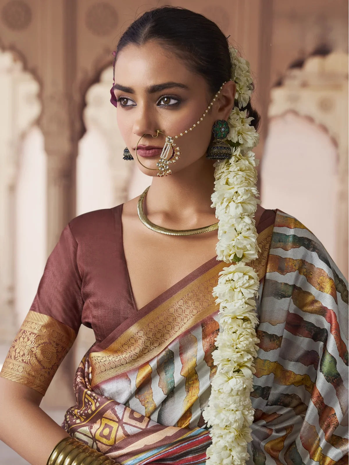 Tarani elegant white silk saree with blouse golden border upper body view