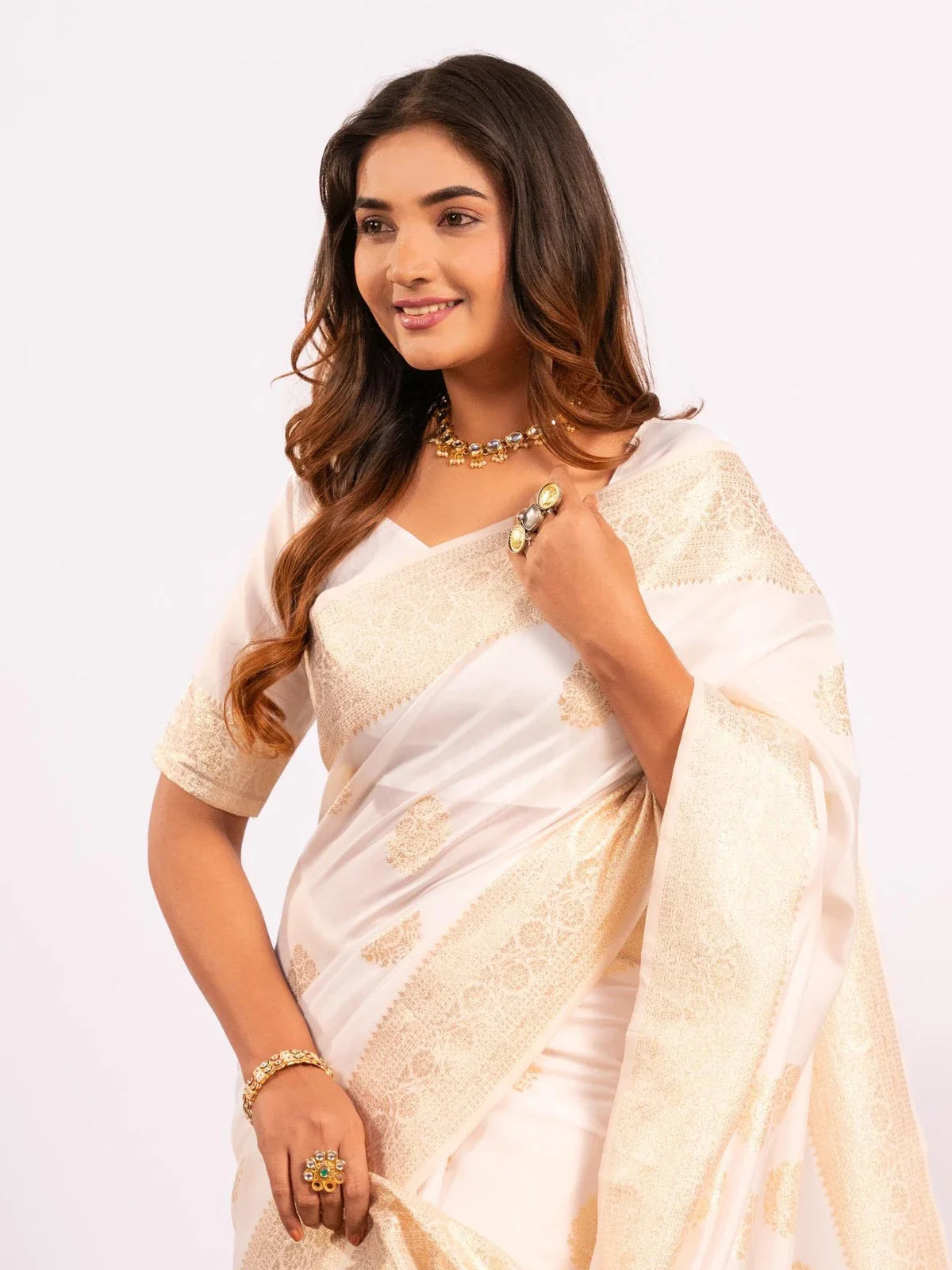 Tarani white banarasi saree showing elegant upper body view with zari weave details