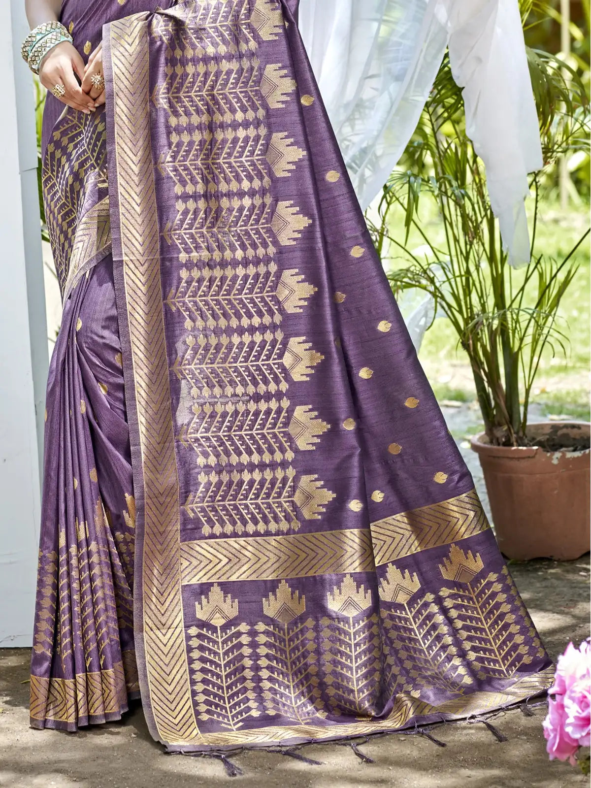 Tarani wine Assam silk saree pallu view with traditional woven border and motifs