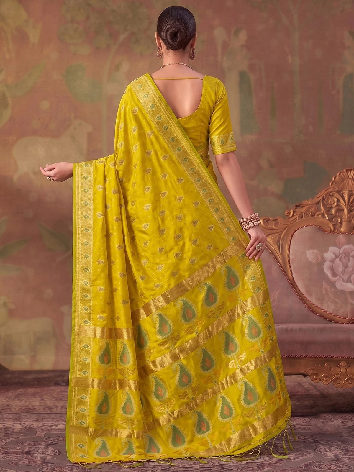 Tarani yellow silk saree with zari weaving back view with rich pallu design