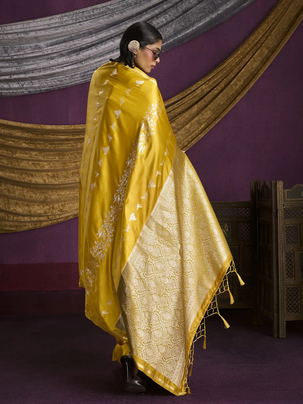 Tarani yellow saree full back drape showing handloom zari and back blouse style