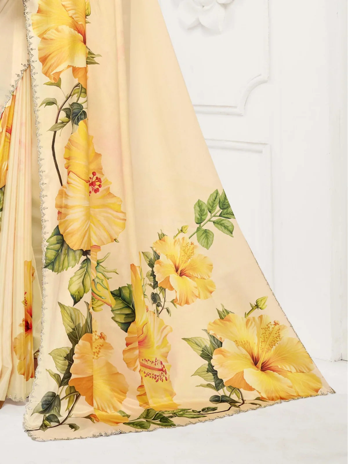 Tarani digitally printed yellow saree with crystal scallop border and close floral detailing