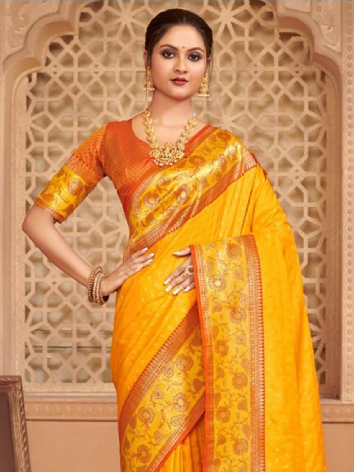 Tarani elegant yellow silk saree front view with rich woven border