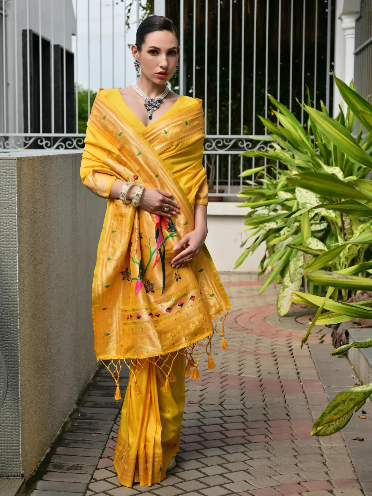 Tarani yellow festive silk saree front view with bird motif pallu