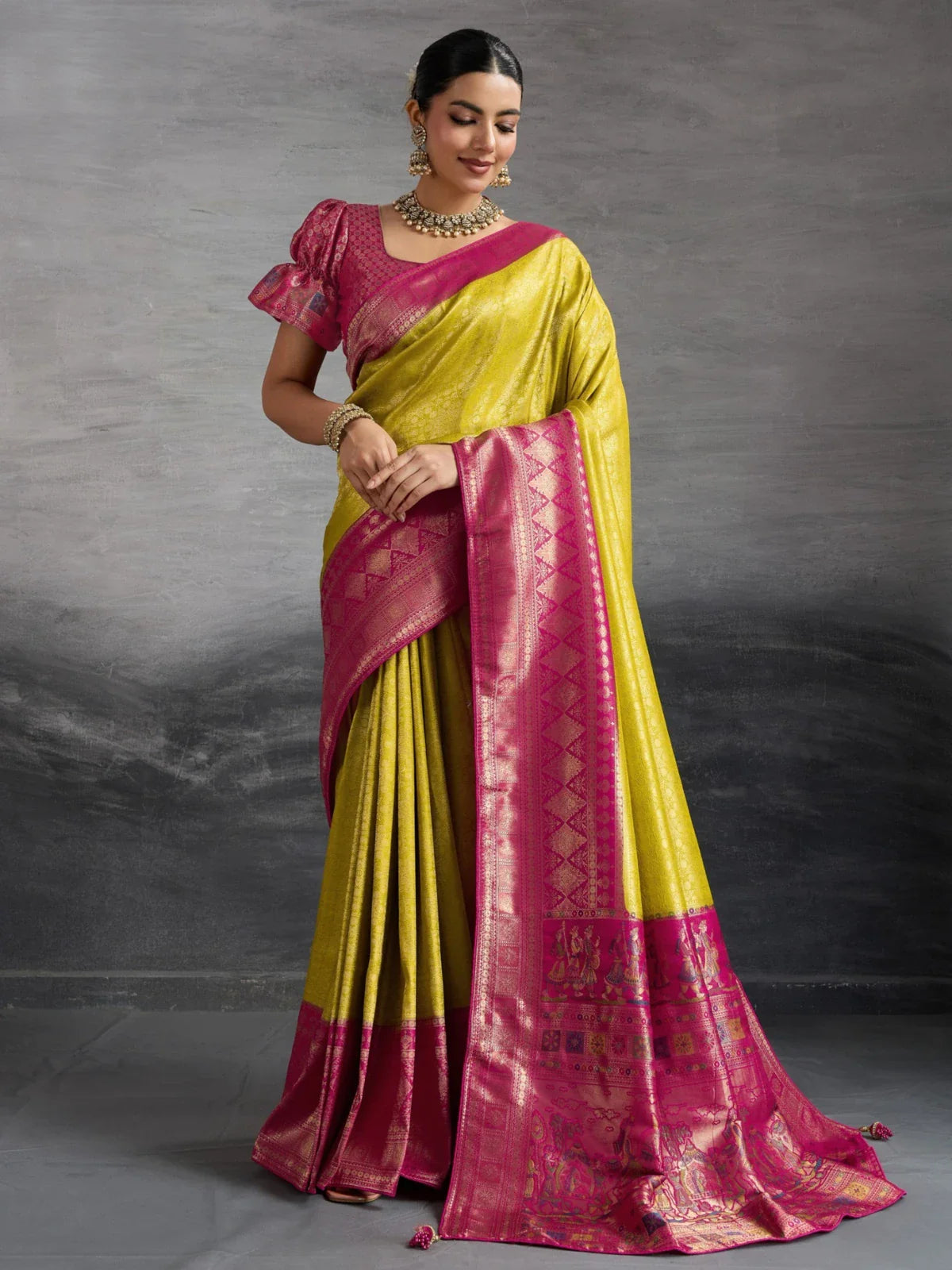 Tarani yellow Kanjivaram silk saree full view with pink zari border and brocade blouse for weddings