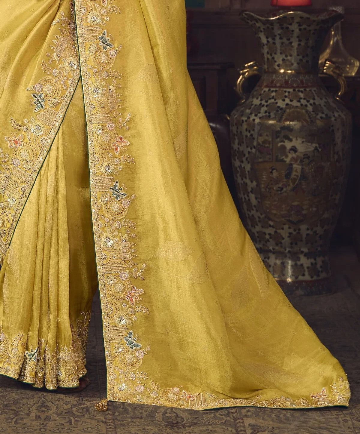 Tarani yellow silk saree with intricate pallu embroidery for weddings and parties
