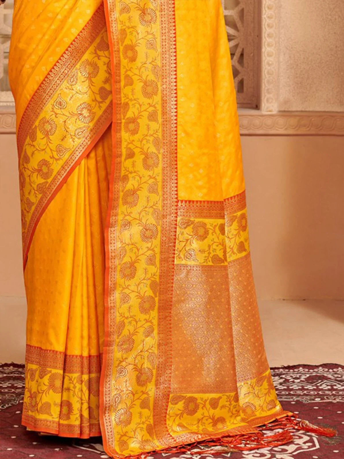 Tarani festive yellow silk saree pallu view with intricate detailing