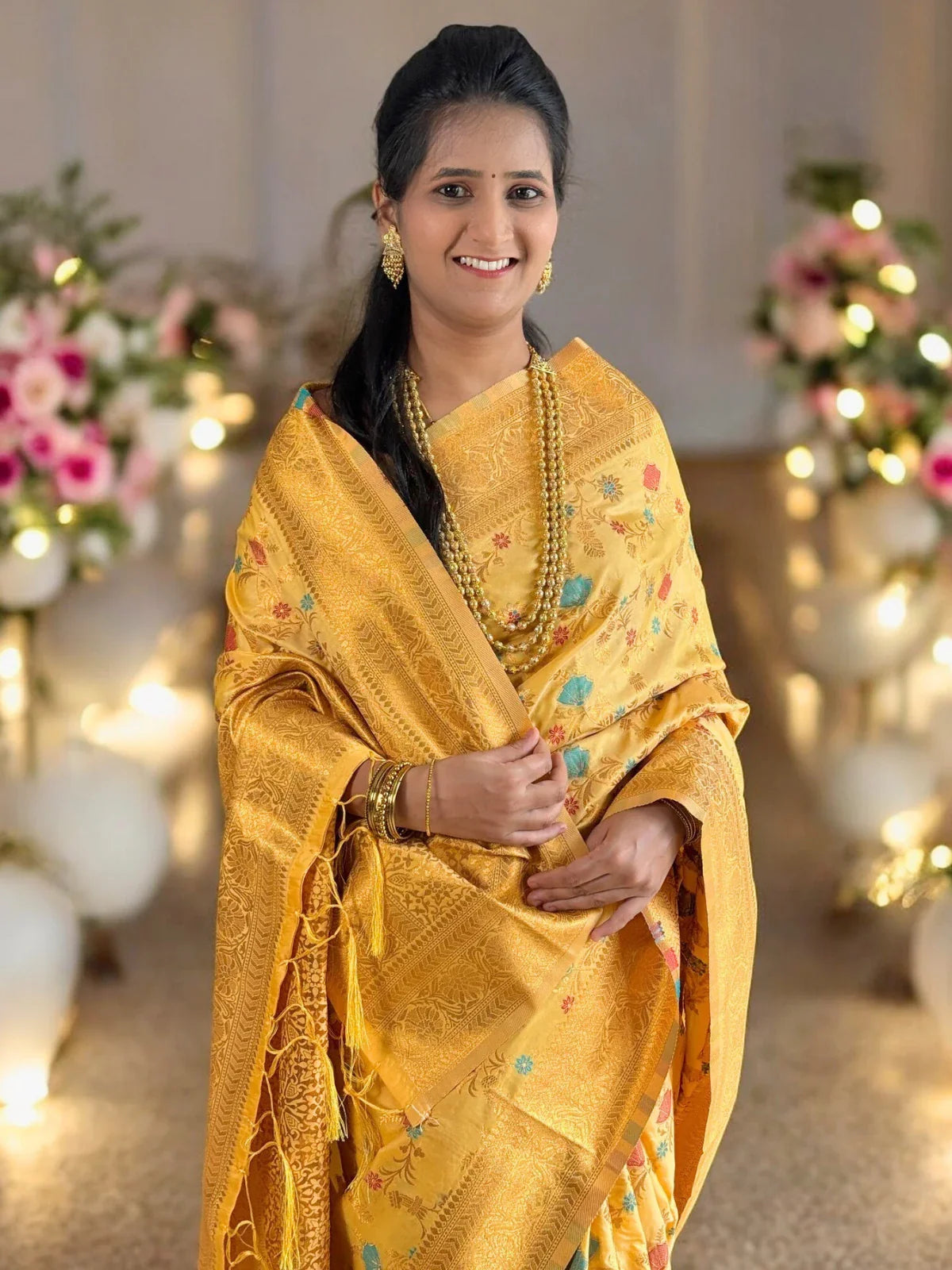 Tarani yellow silk saree upper body view showing blouse and pallu
