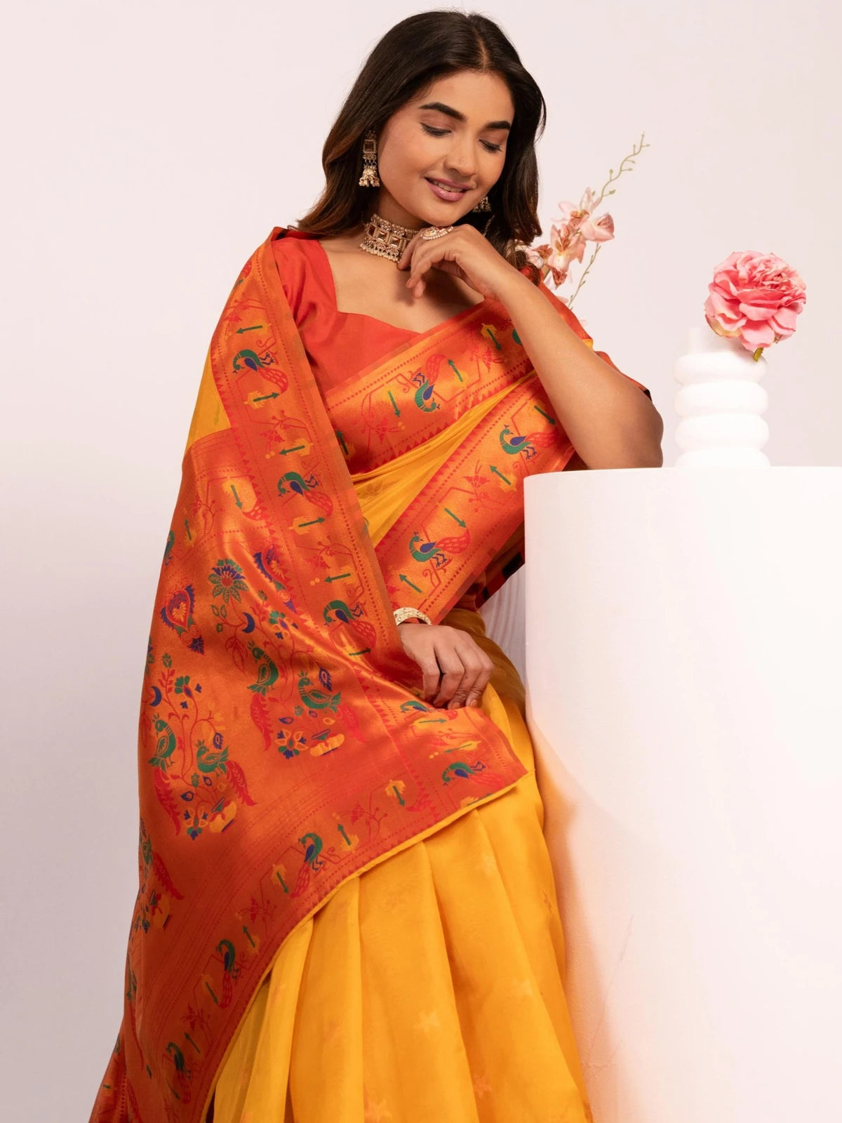 Tarani yellow Paithani saree upper body view showing zari woven pallu