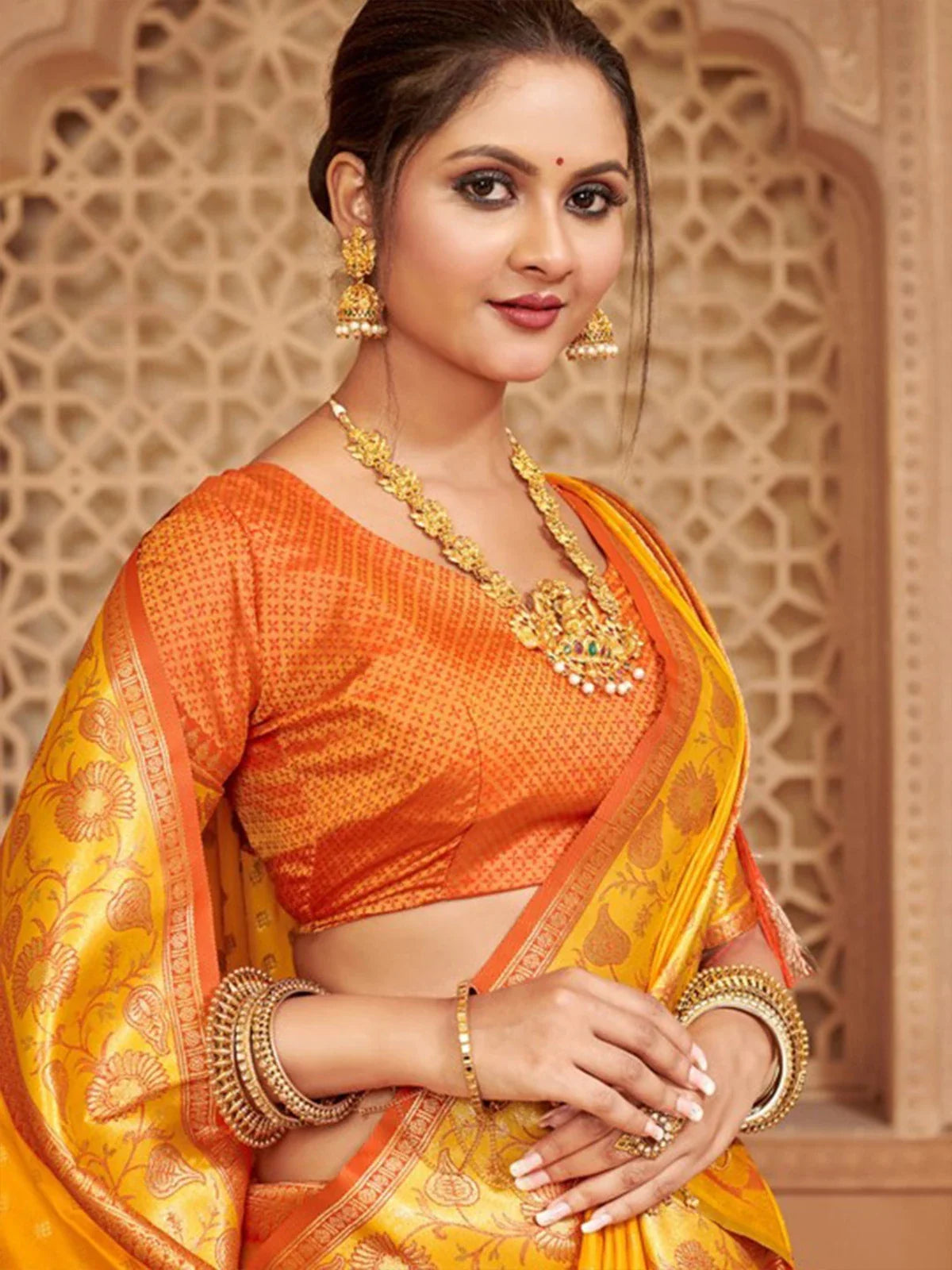 Tarani yellow silk saree upper body view with contrast blouse design
