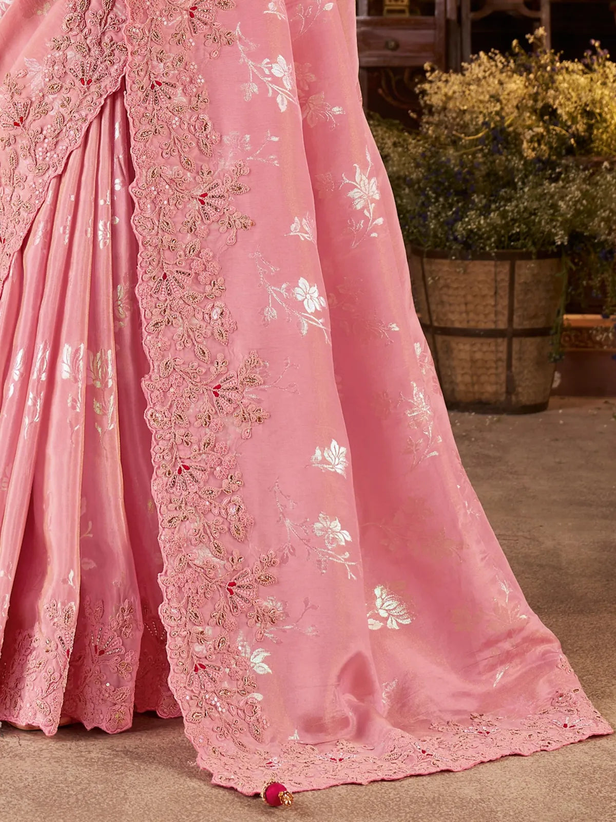 Tarani zari embroidered pink saree pallu and border close-up by Tarani