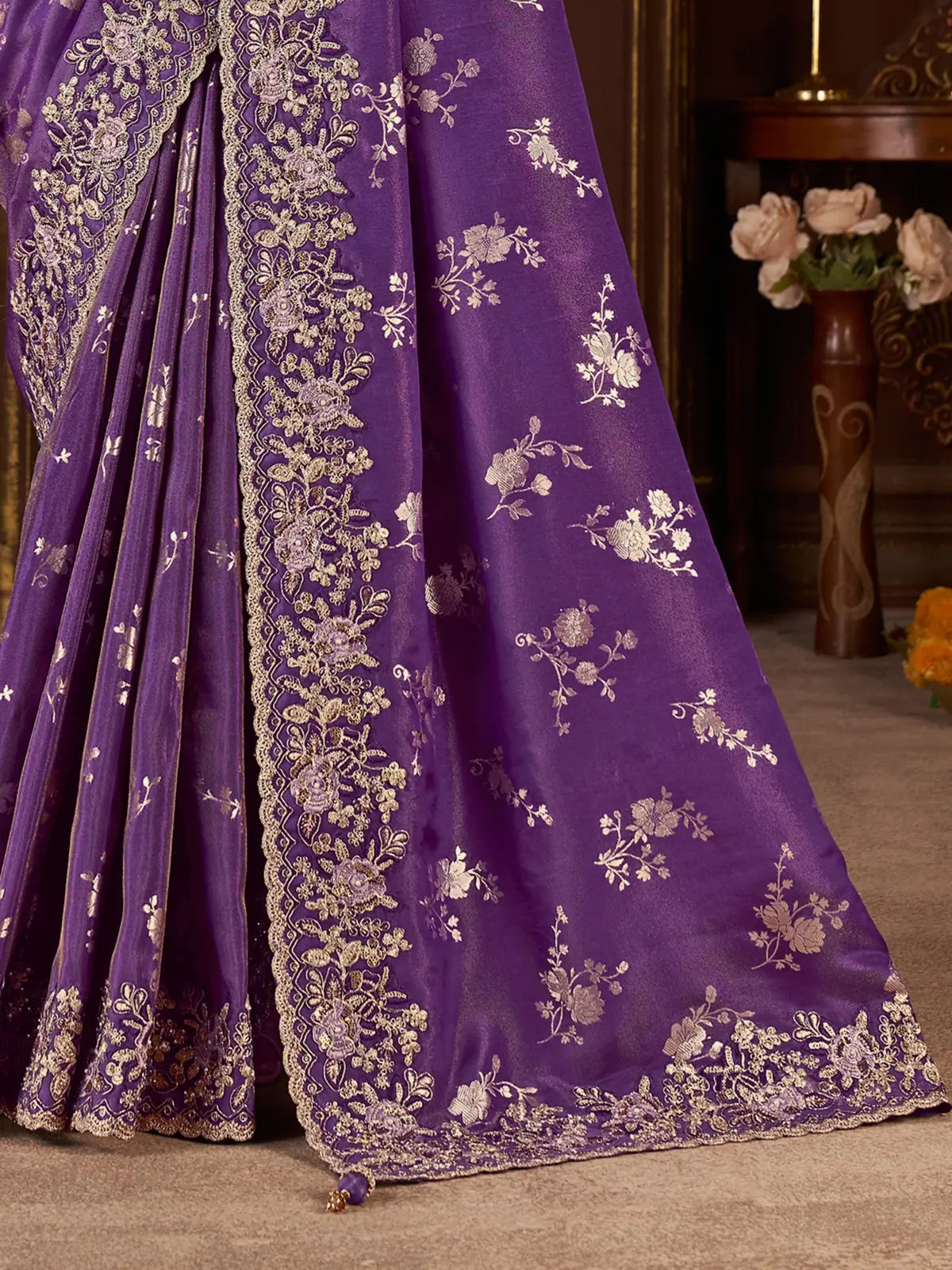 Tarani purple saree border and zari detailing closeup view with fine embroidery