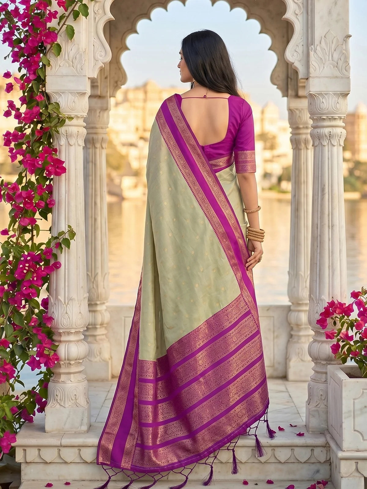 Tarani back view soft silk saree with zari woven pallu and magenta blouse design