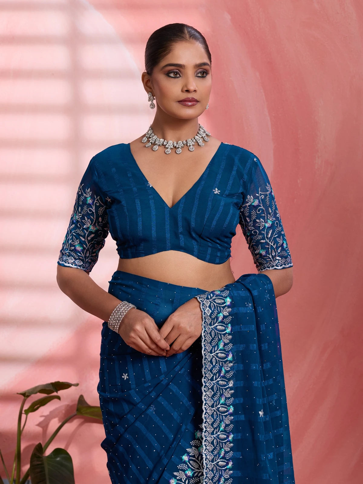 Tarani navy blue solo chiffon saree upper body view with embroidered blouse and elegant festive styling