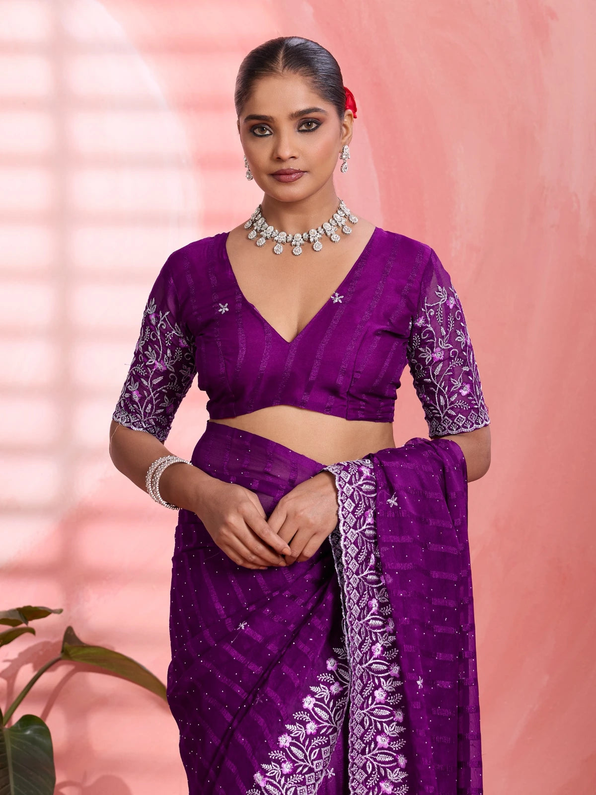 Tarani purple solo chiffon saree upper body view with embroidered blouse detailing