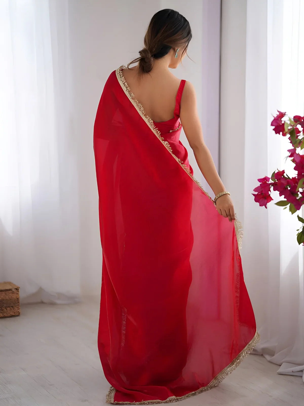 Tarani red space silk saree back pose showing blouse with lace border – blouse view