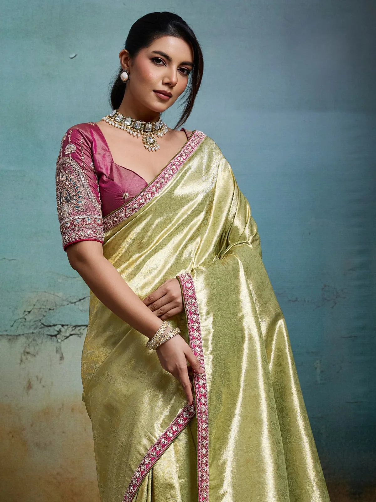 Tarani green tissue Banarasi party wear saree with detailed embroidered blouse upper body view