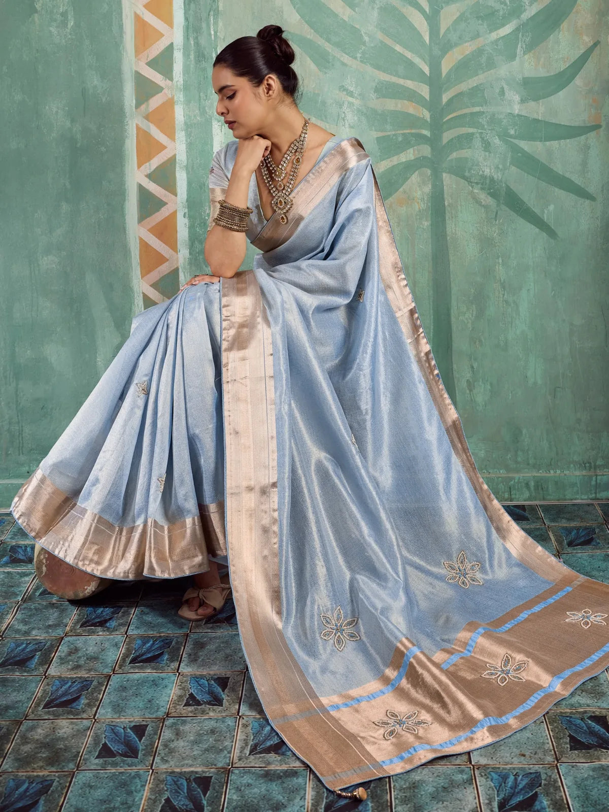 Tarani Maitri blue tissue cotton saree full drape view with metallic border and floral buttas