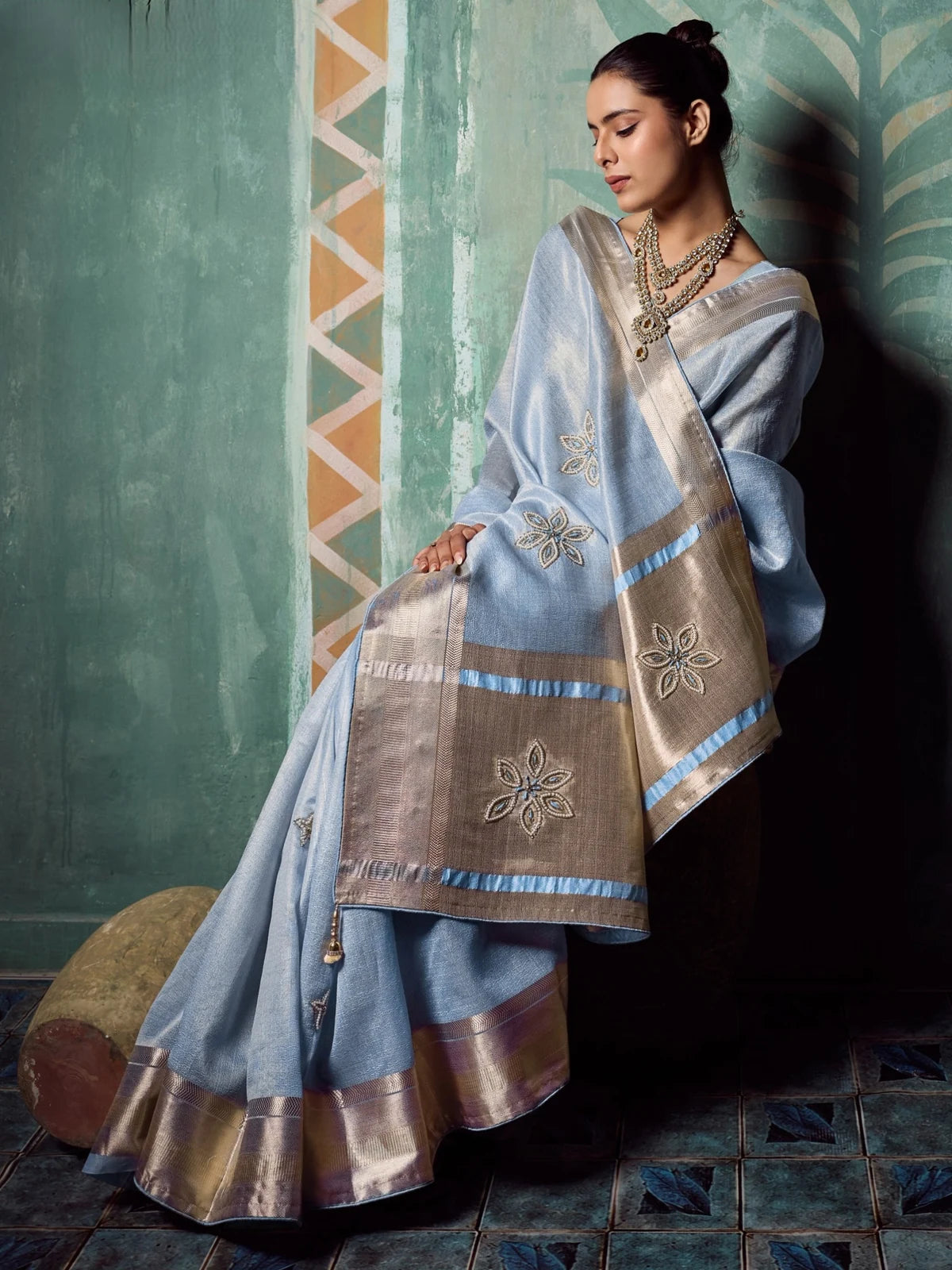 Tarani Maitri blue tissue cotton saree pallu view with pearl sequin embroidery and latkan