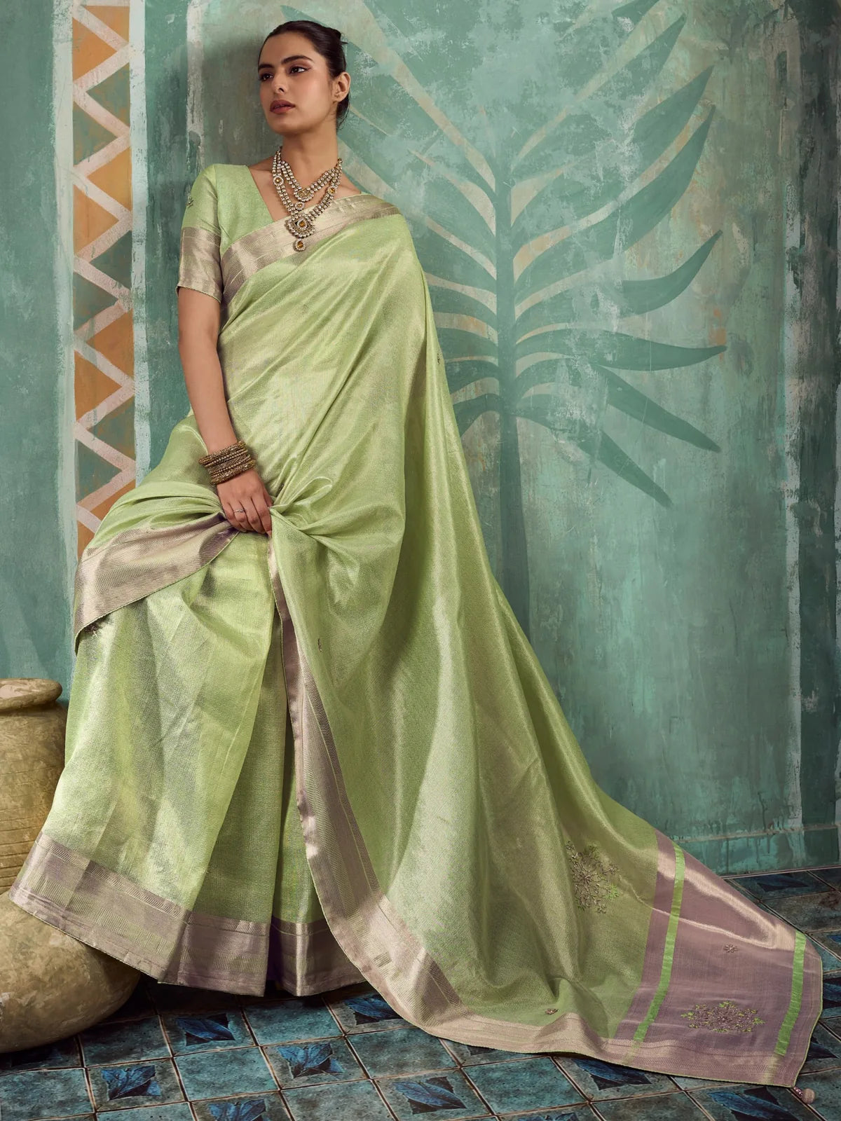 Tarani Hemali green tissue cotton saree full drape view with handwork buttas and elegant border