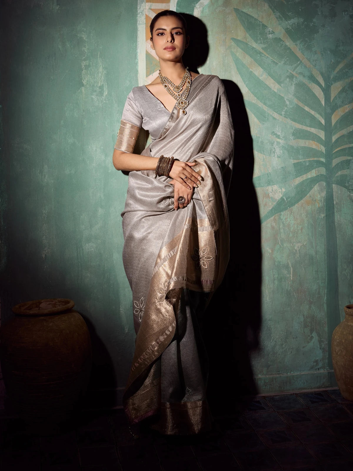 Tarani Mudra silver tissue cotton saree front view with shimmering drape, handwork buttas and border