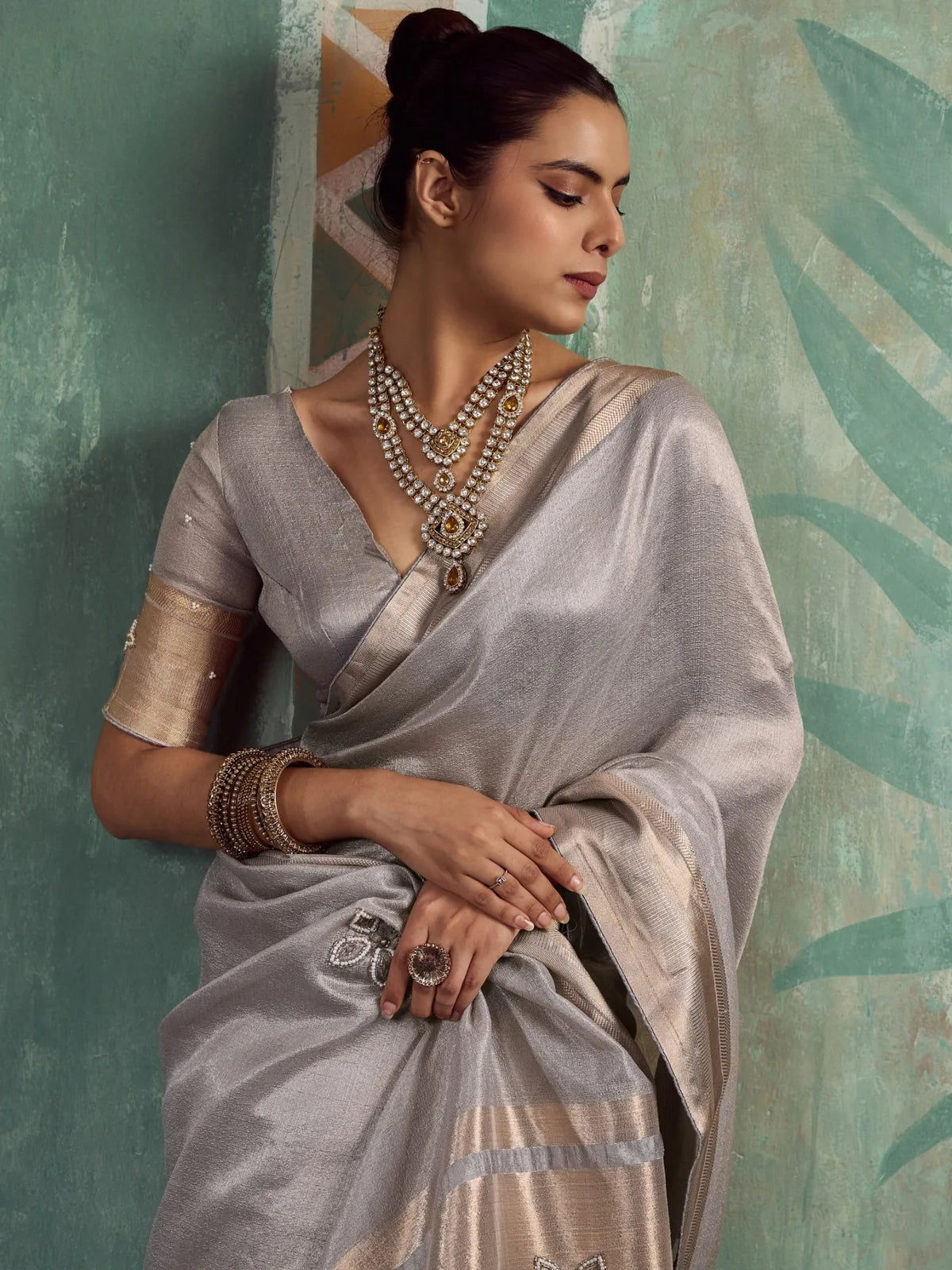 Tarani Mudra silver tissue cotton saree upper body view with handwork buttas and running blouse