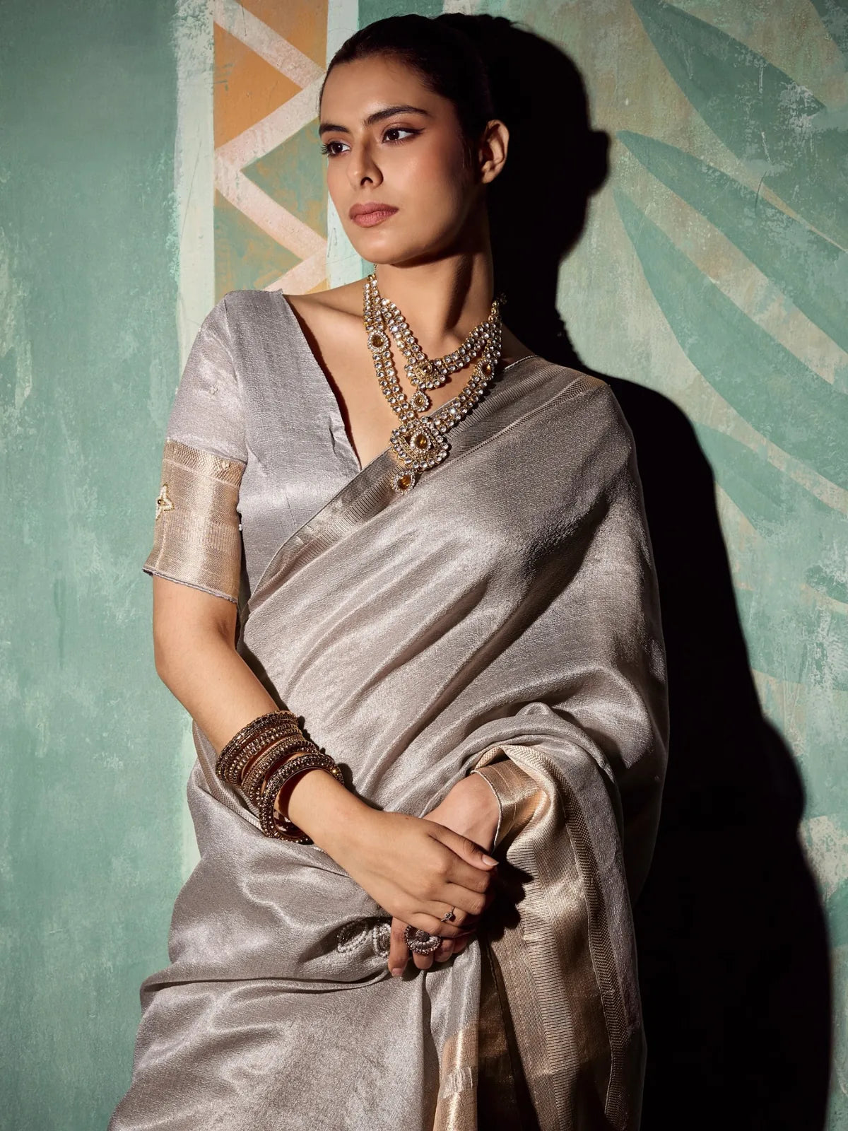 Tarani Mudra silver tissue cotton saree upper body view highlighting blouse sleeves and handwork