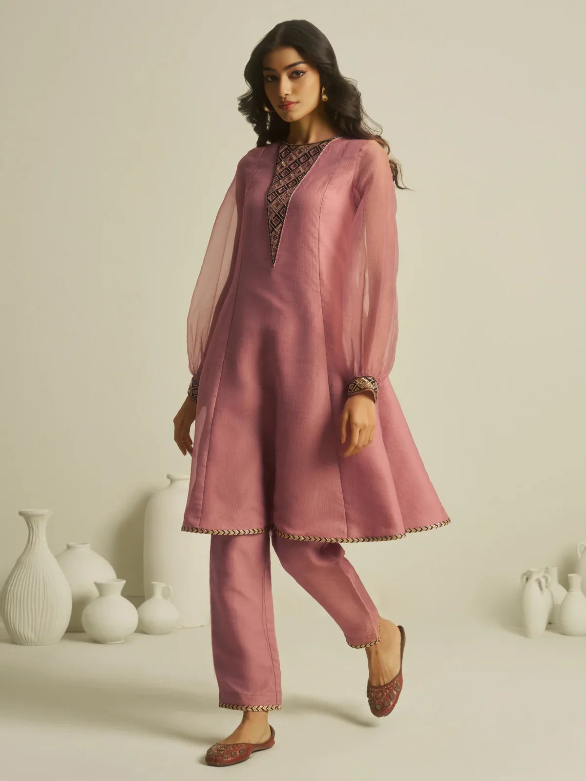 Tarani pink tissue festive dress with elegant handwork in front view