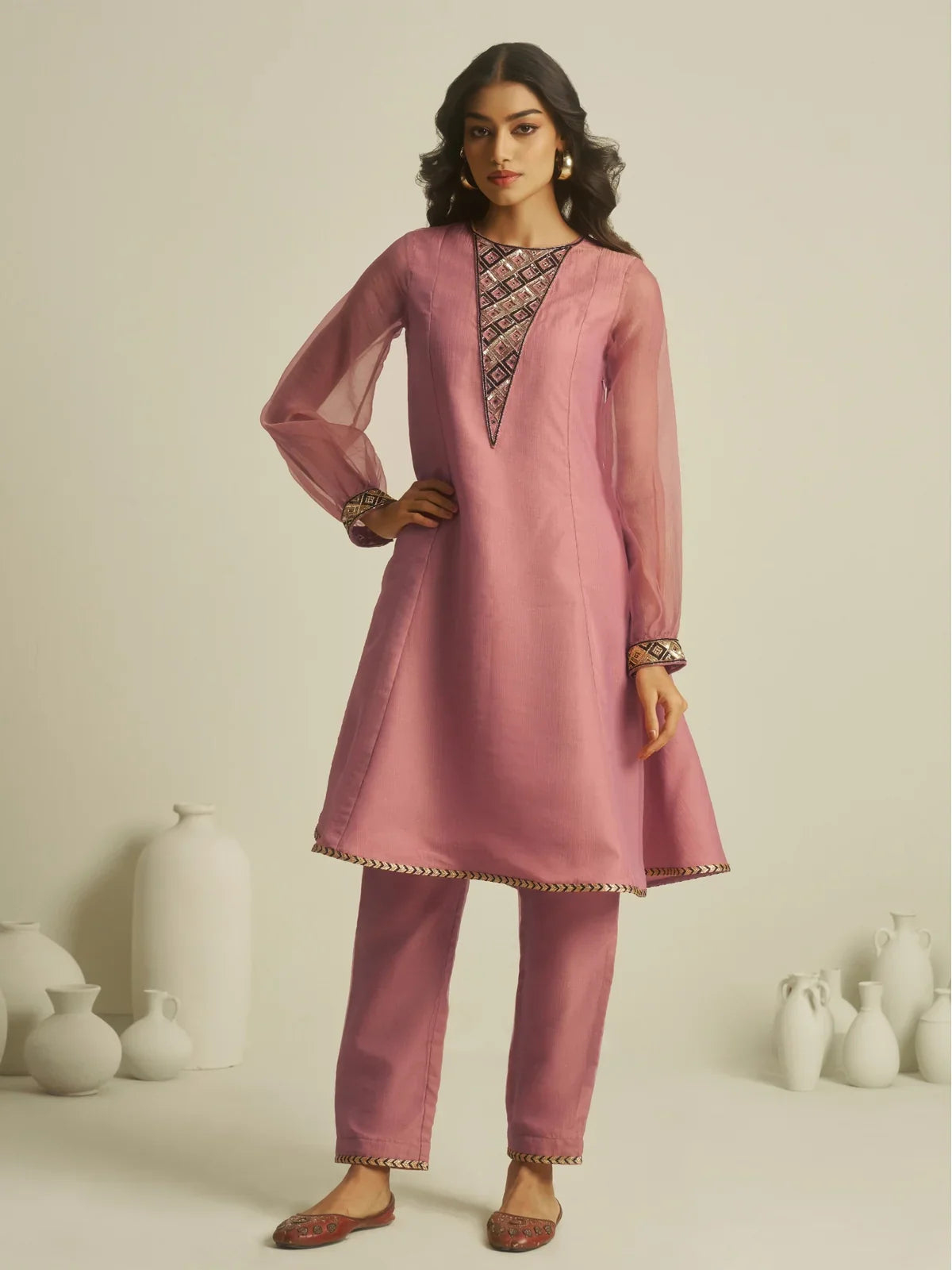 Tarani pink tissue festive dress with elegant handwork in full view