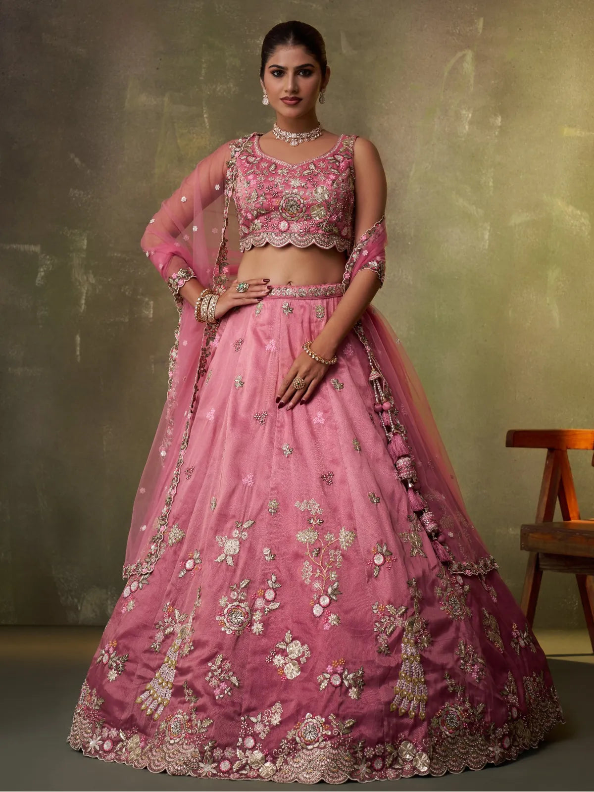 Tarani premium pink tissue lehenga full front view with embroidery and ethnic tassels