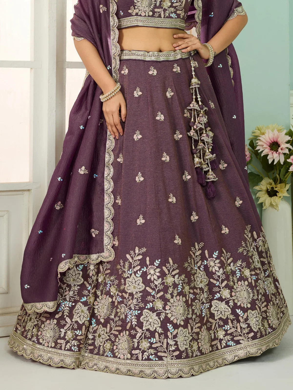 Tarani purple tissue lehenga close-up view showing detailed embroidery and mirror work