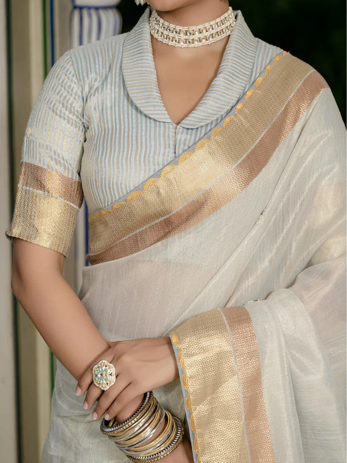 Tarani blouse closeup with khatli butti embroidery and zari border