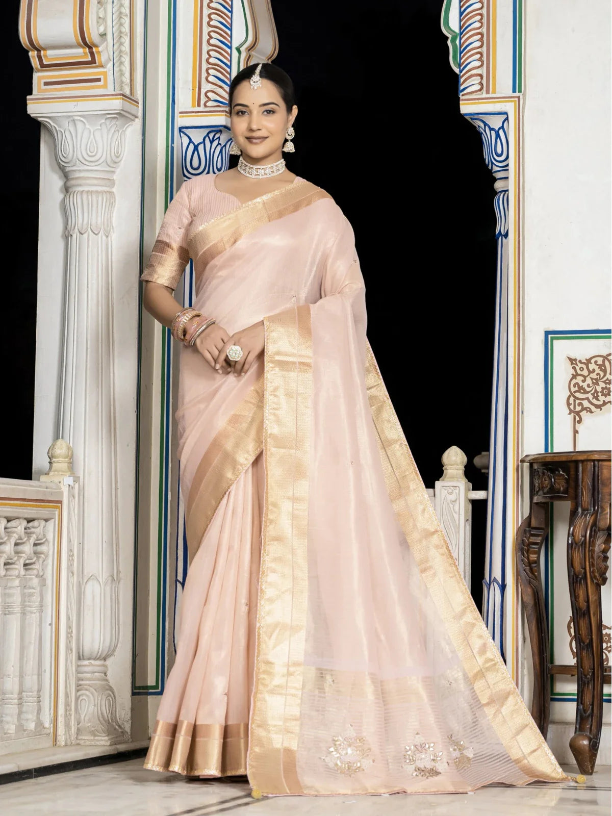 Tarani peach tissue linen saree with zari patta full view elegant festive party wear