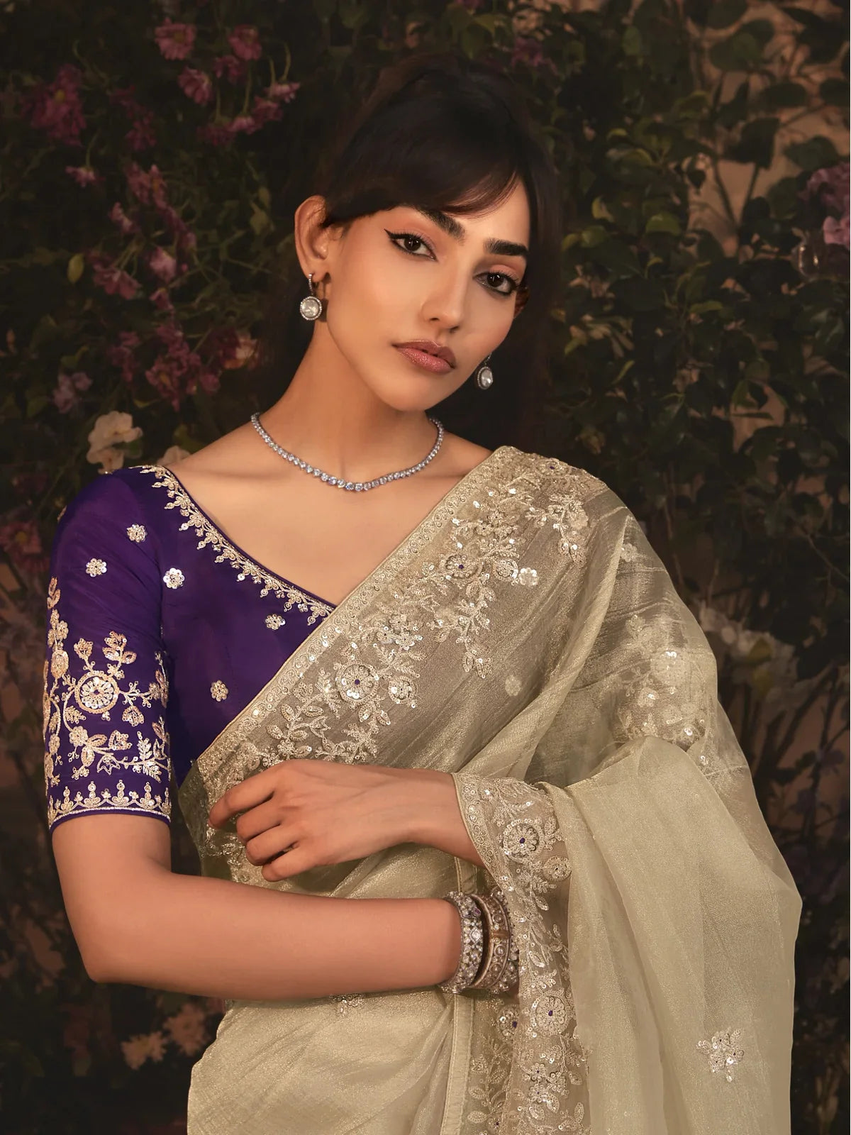 Tarani beige tissue organza saree with embroidery close upper body view