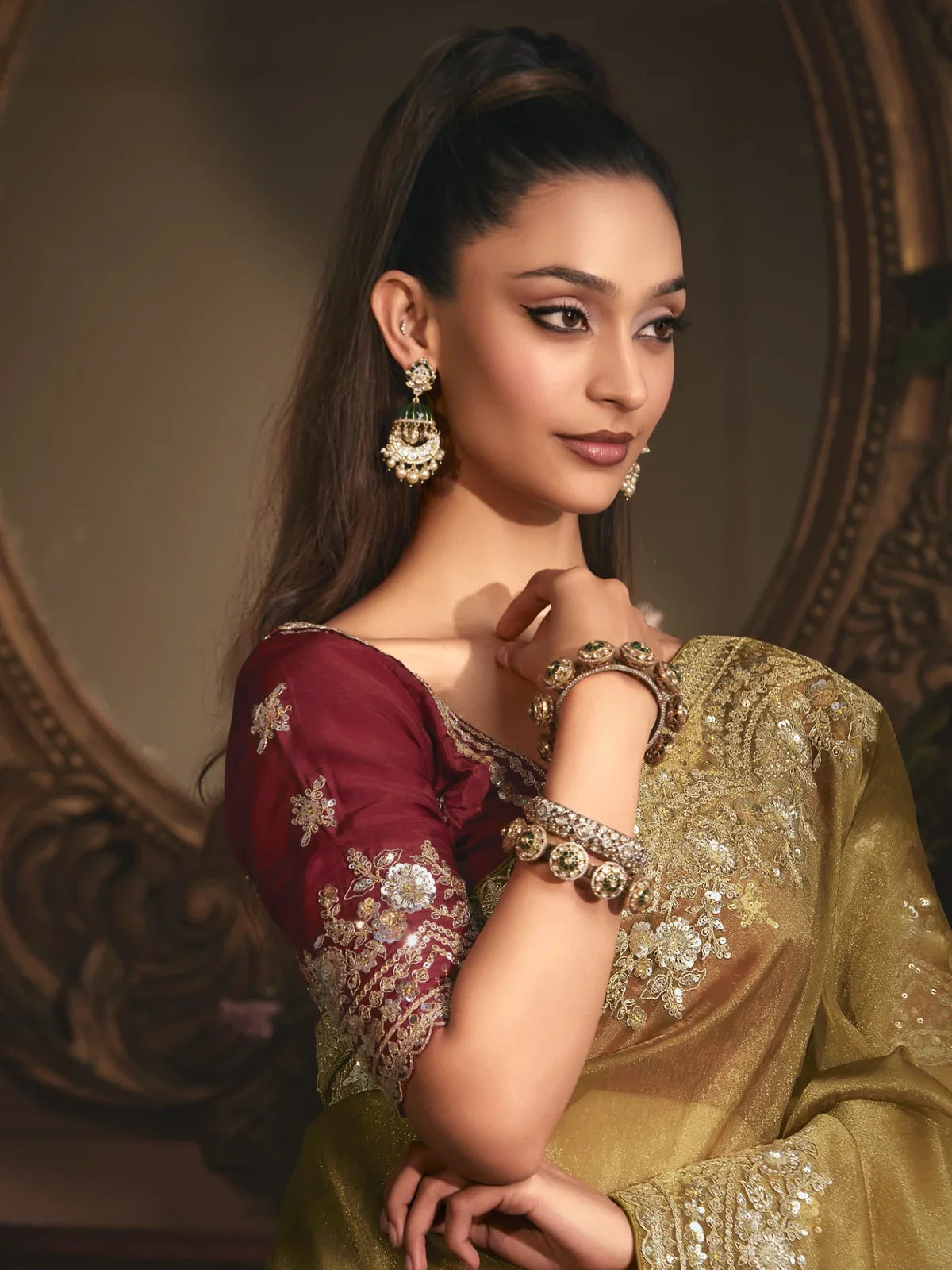 Tarani designer green saree side pose showing embroidery and drape style