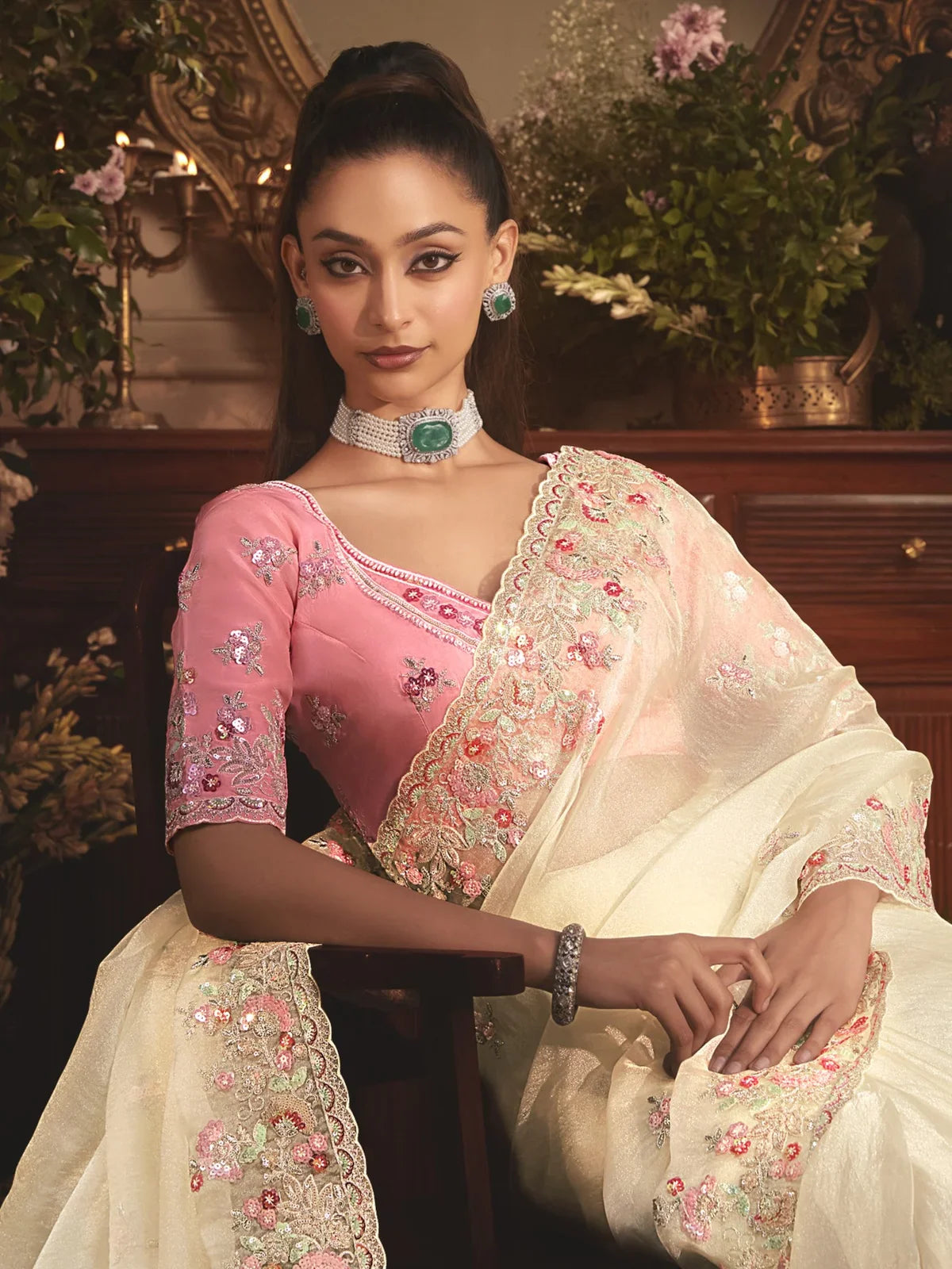 Tarani off white tissue organza saree front view highlighting embroidery border and heavy work blouse