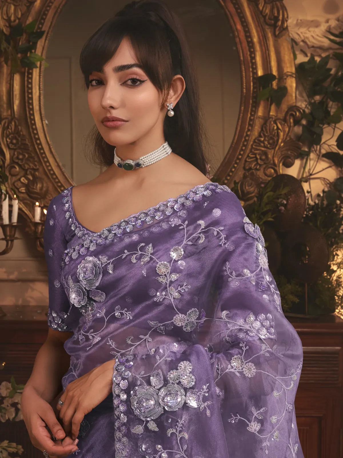 Tarani purple tissue organza saree close up of embroidery and blouse upper body view