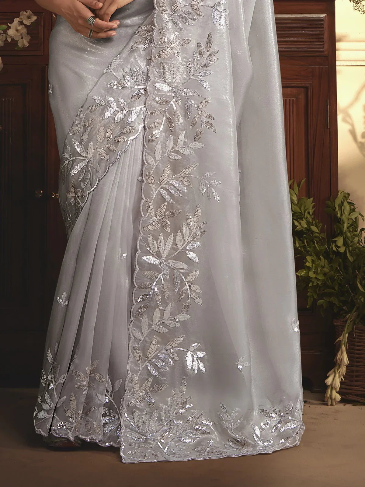 Tarani silver tissue organza saree close pallu view with stone and embroidery work