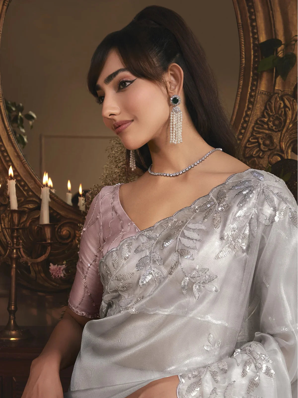 Tarani silver tissue organza saree side pose highlighting drape and border