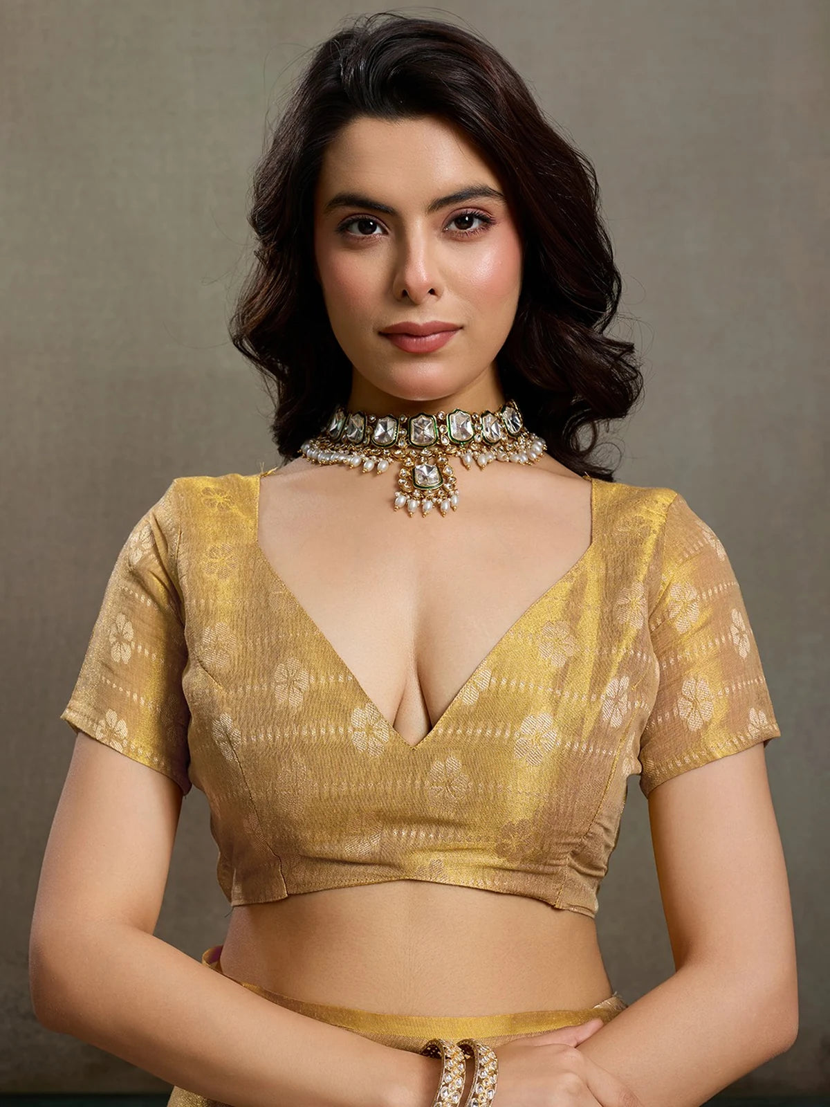 Tarani Samaira golden tissue silk blouse view with woven floral design and elegant neckline